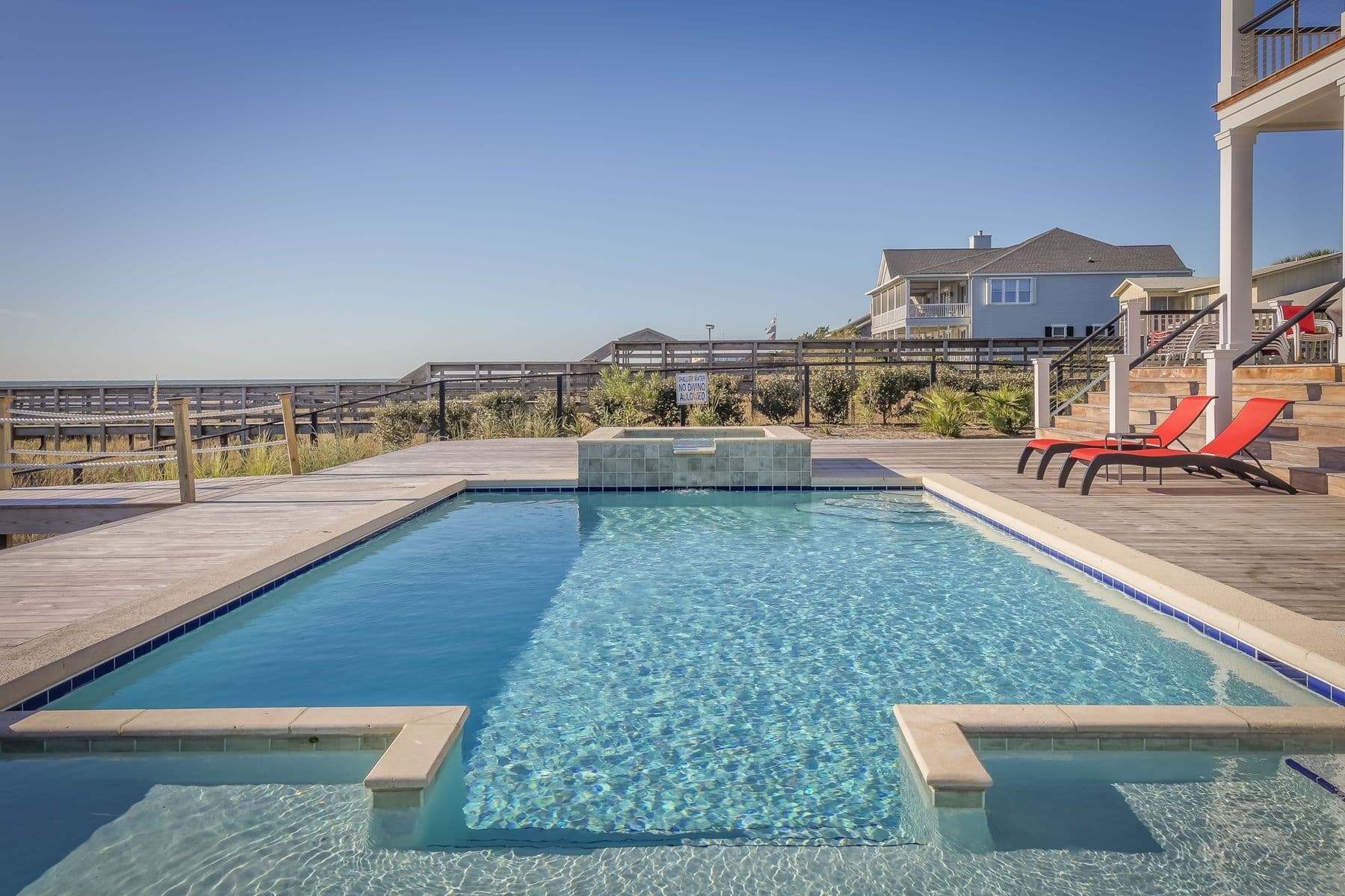 Pool court with deck and planting edge